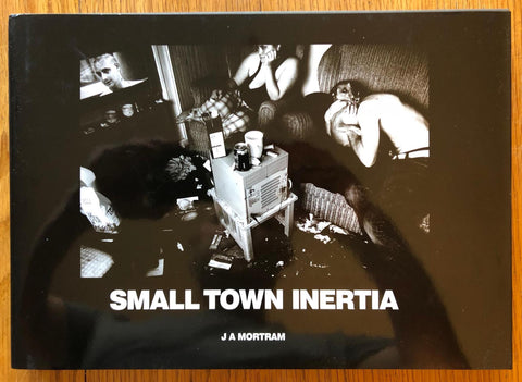 The photography book cover of Small Town Inertia by J A Mortram. Signed. Print.
