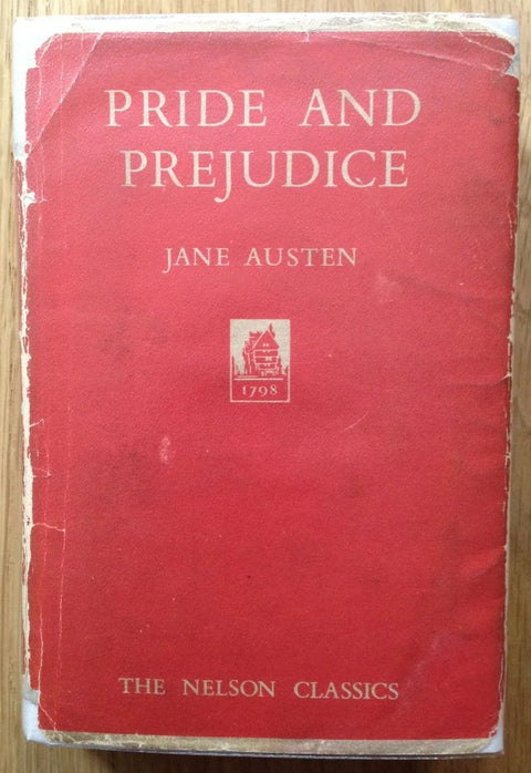 The book cover of Pride and Prejudice by Jane Austen. Hardback in red.