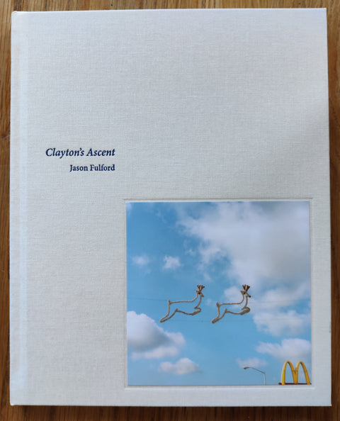 The photobook cover of Clayton's Ascent by Jason Fulford. In hardcover white.