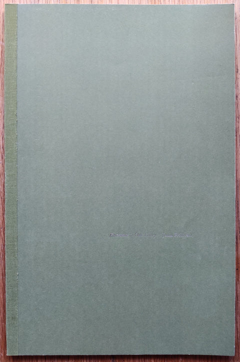 The photography cover of Entrance to Our Valley by Jenia Fridlyand. In paperback green.