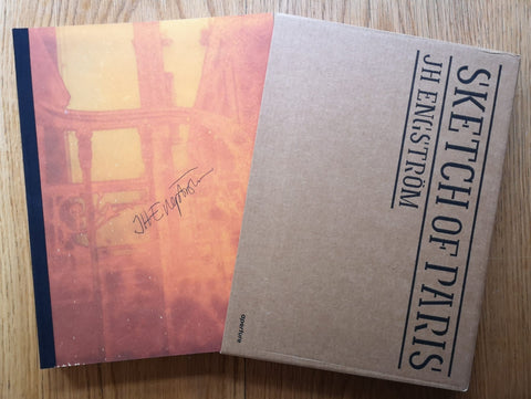 The photography book cover of Sketches of Paris by JH Engstrom. Hardback orange cover in a brown cardboard slipcase. Signed.