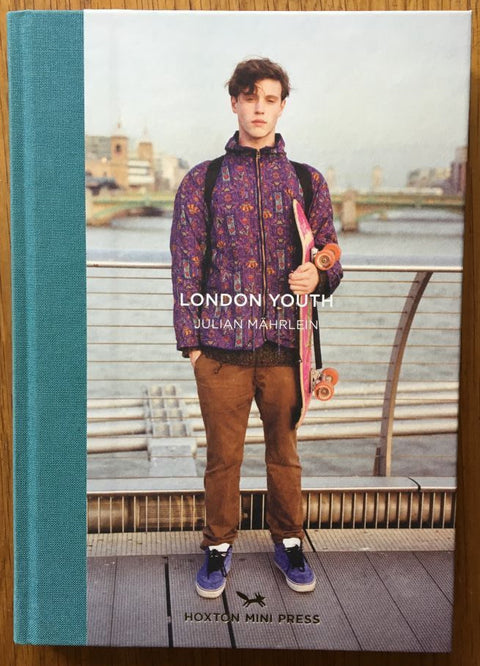The photography book cover of London Youth by Julian Mahrlein. Hardback with a man on the front.