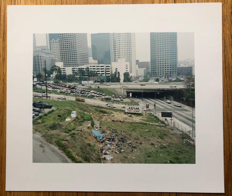 The print for photography book Angels in Fall by Karin Apollonia Muller. Hardback book with print of urban landscape. Signed.