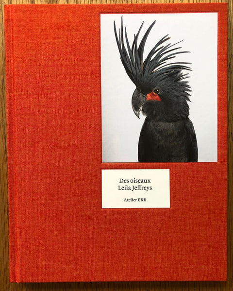 The photography book cover of Des Oiseaux by Leila Jeffreys. Hardback in red.