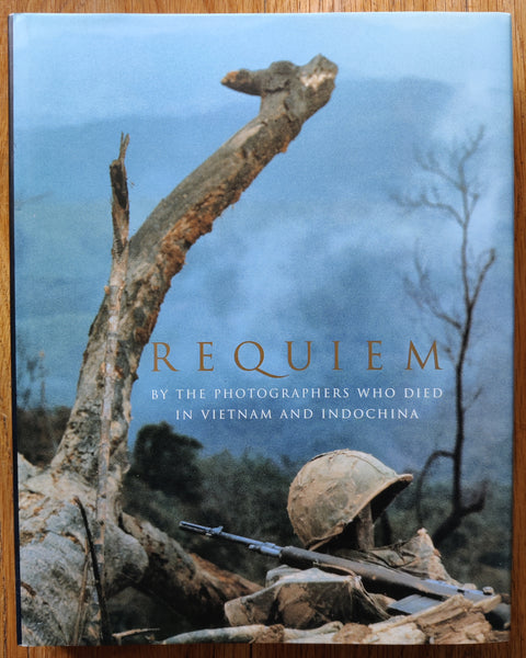 The photography book of Requiem: By the Photographers Who Died in Vietnam and Indochina. In dust jacketed hardcover black.
