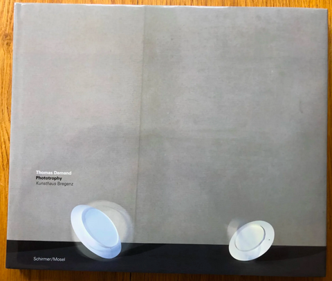 The photography book cover of Phototrophy by Thomas Demand. Hardback in grey and black.