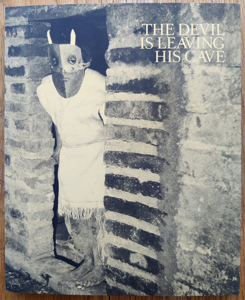 The photography book cover of The Devil is Leaving his Cage by Wendy Ewald. In softcover.