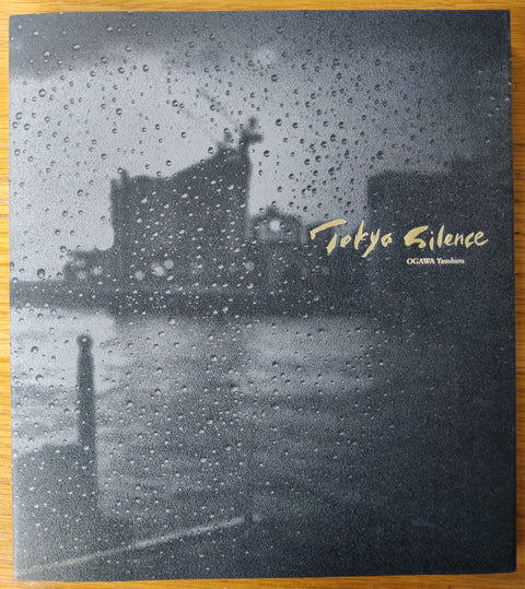 The photobook cover of Tokyo Silence by Yasuhiro Ogawa. In dust jacketed hardcover. Signed.