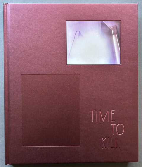 Book titled 'Time To Kill' by Ahndraya Parlato with a burgundy cover with a tipped in image of an open sets of doors.