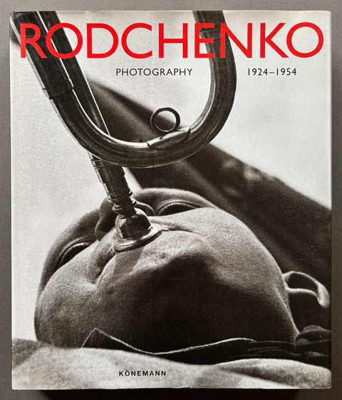 Book titled 'Rodchenko: Photographs 1924-1954' by Alexander Rodchenko with a cover featuring a black and white image of a man playing a brass horn.