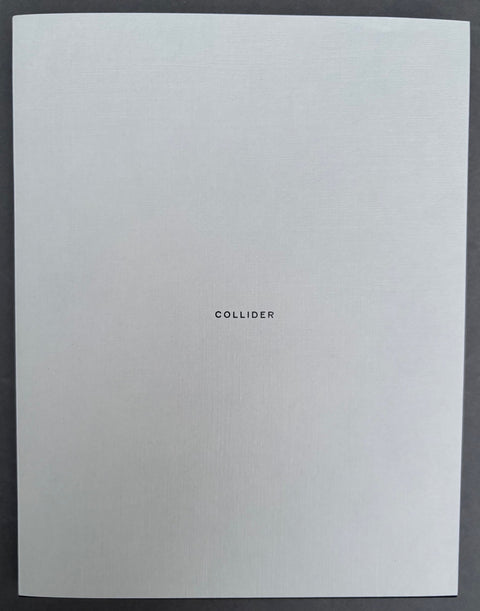 Book titled 'Collider' by Carl Wooley with a white cover.