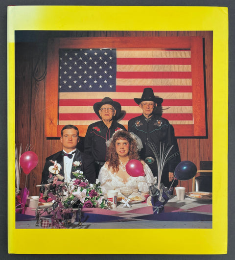 Book titled 'Colophon' by Chris Verene with a yellow cover featuring an image of a couple in wedding attire sitting at a table with 2 men standing behind them wearing cowboy hats.