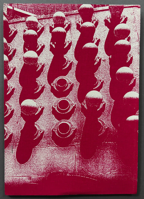 Book titled 'Naomi' by Daido Moriyama with a red and white cover.