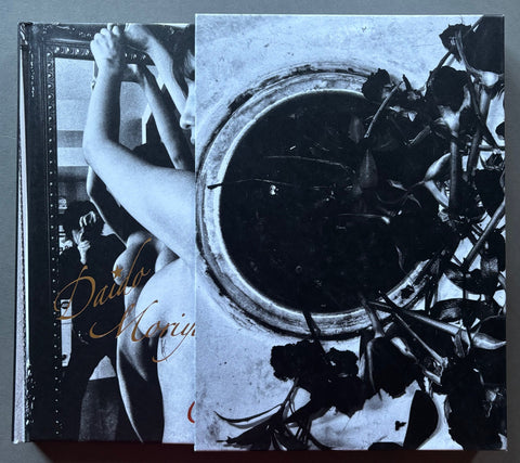Book titled 'Orizuru' by Daido Moriyama with a black and white cover featuring roses.
