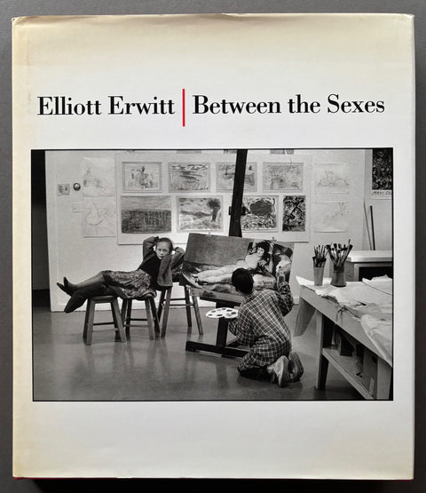 Book titled 'Between the Sexes' by Elliott Erwitt with a white cover featuring a photograph of a man painting a woman.