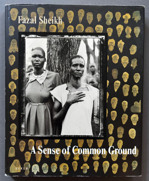 Book titled 'A Sense of Common Ground' by Fazal Sheikh with a black cover featuring an image of 2 woman.