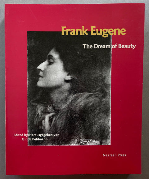 Book titled 'The Dream of Beauty' by Frank Eugene with a red cover featuring the black and white image of the profile of a woman.