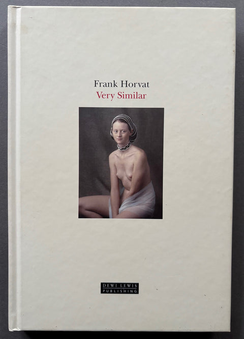 Book titled 'Very Similar' by Frank Horvat with a white cover featuring the image of a naked woman sitting with a shawl around her waist.