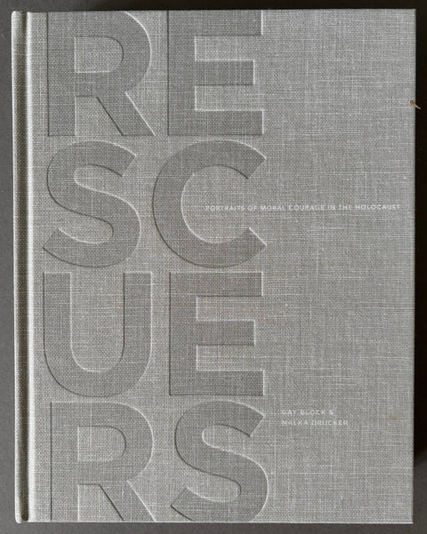 Book titled 'Rescuers: Portraits of Moral Courage in the Holocaust' by Gay Block with a grey cloth cover.