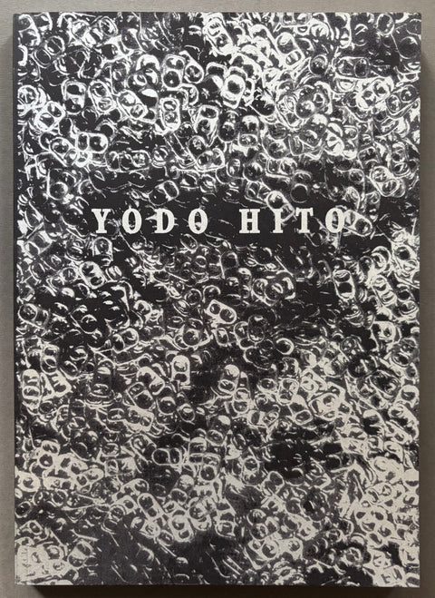 Book titled 'Yodo Hito' by George Booth-Cole with a black and white cover featuring an image of thousands of ring pulls.