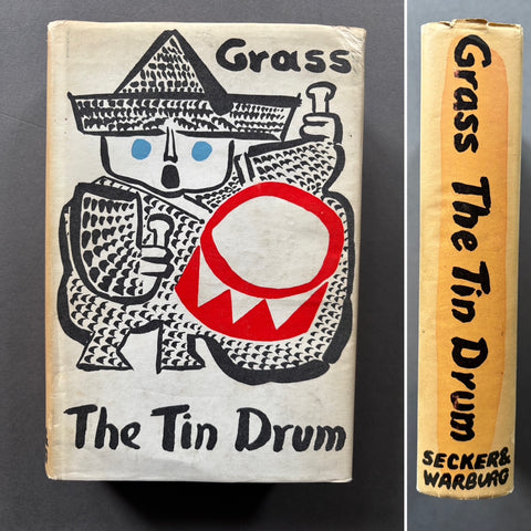 Book titled 'The Tin Drum' by Günter Grass with a white cover including an image of a person with a drum.