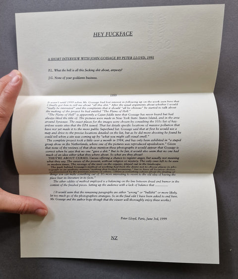 The open letter with the headline 'HEY FUCKFACE' at the top and text below, including the name 'John Gossage' and 'Peter Lloyd'.