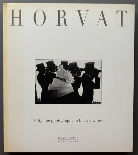 Book titled 'Horvat: Fifty One Photographs in Black & White' by Frank Horvat with a white cover featuring an image of 5 men in suits and top hats and a woman wearing a white shawl and hat.