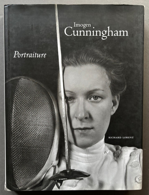 Book titled 'Portraiture' by Imogen Cunningham with a cover featuring the image of a woman in fencing attire.
