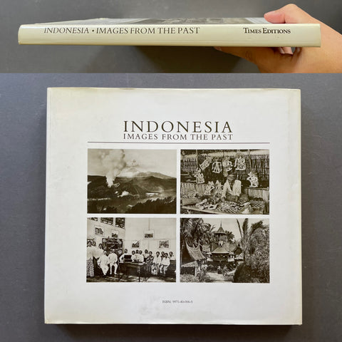 A book titled 'Indonesia Images from the Past' by Times Editions is shown from the back, with a hand holding the top edge. The cover features four black-and-white vintage photographs.