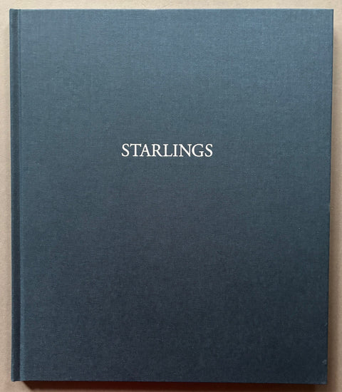 Book titled 'Starlings' by Jem Southam with a blue cover.