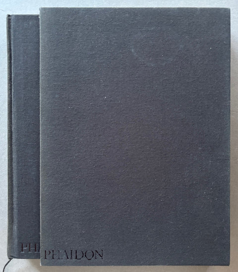 Book titled 'The Mennonites' by Larry Towell with a black cover in a black slipcase.