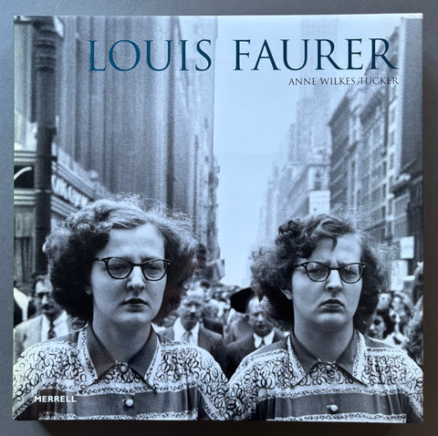Book titled 'Louis Faurer' by Louis Faurer with a cover featuring a photograph of identical twin women.