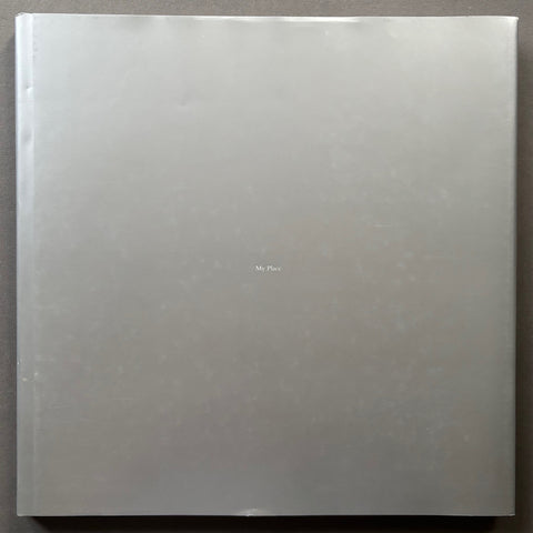 Book titled 'My Place' by Madoka Takagi with a silver cover.