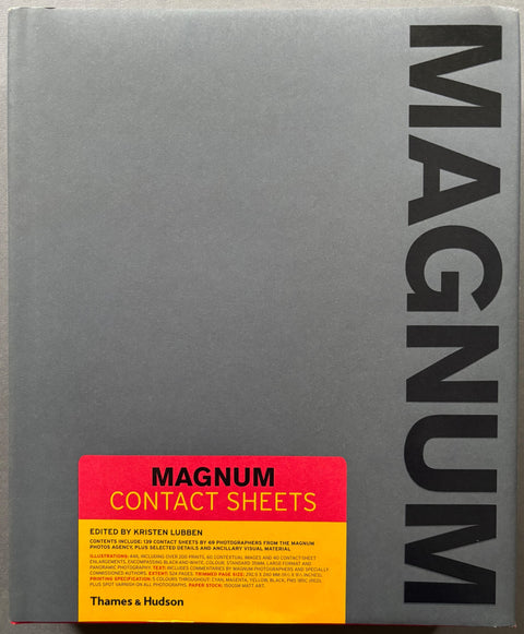 Book titled 'Magnum Contact Sheets' by various photographers with a grey cover.