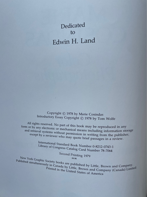 A close-up of a book's dedication page, printed on light gray paper with black text reading 'Dedicated to Edwin H. Land' and copyright details for 1978.