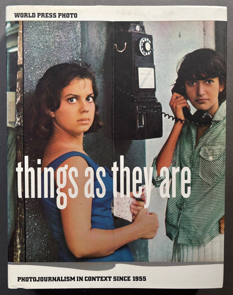 Book titled 'Things As They Are' by Mary Panzer with a cover featuring the image of a young woman and man using a pay phone.