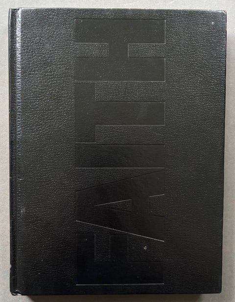 Book titled 'Faith: A Journey With Those Who Believe' by Mike Abrahams with a black cover.