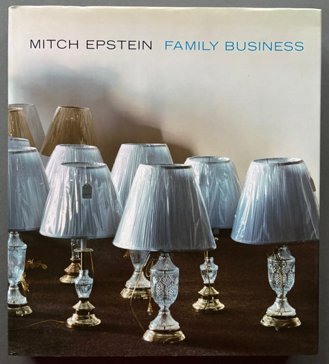 Book titled 'Family Business by Mitch Epstein with a cover featuring the image of table lamps.
