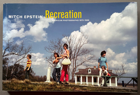 Book titled 'Recreation' by Mitch Epstein with a cover featuring a photograph of women and children walking along a path in front of a house.