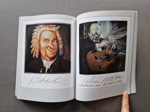An open book showing two big polaroids on each page
