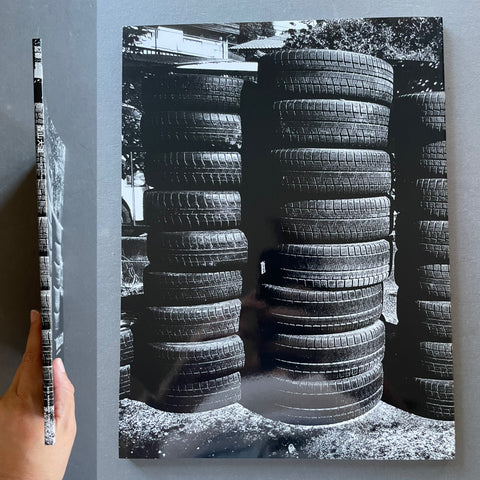 Back of Record No.53 by Daido Moriyama with tires.