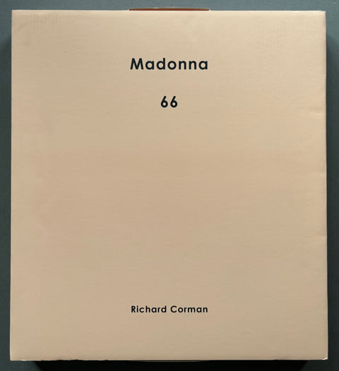 Book titled 'Madonna 66' by Richard Corman with a pink cover in a pink box.