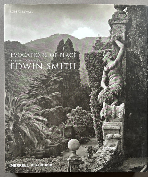 Book titled 'Evocations of Place: The Photography of Edwin Smith' by Robert Elwall with a cover featuring the black and white image of a garden including a piece of architectural sculpture.