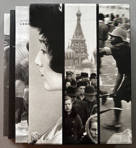 Books titled 'Tokyo, Moscow, Leopoldville' by Robert Lebeck in a slipcase featuring black and white images from each of the books.