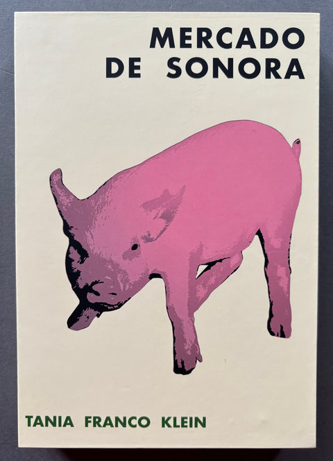 Book titled 'Mercado De Sonora' by Tania Franco Klein with a beige cover featuring the image of a bright pink pig.