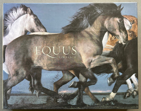 Book titled 'Equus' by Tim Flach with a cover featuring an image of running horses'