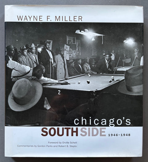 Book titled Chicago's Southside 1946-1948' by Wayne F. Miller with a white cover featuring an image if a group of people playing pool.