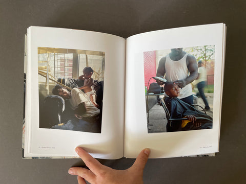 Color images of a broken blind with woman and child and haircut. 