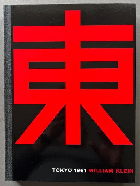 Book titled 'Tokyo 1961' by William Klein with a black cover featuring a Japanese character in red.