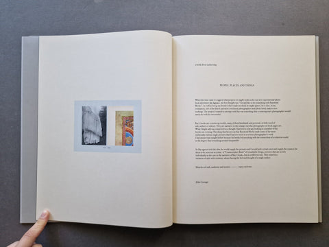 An open book spread, showing printed text on the right page and a small inset artwork on the left page. 